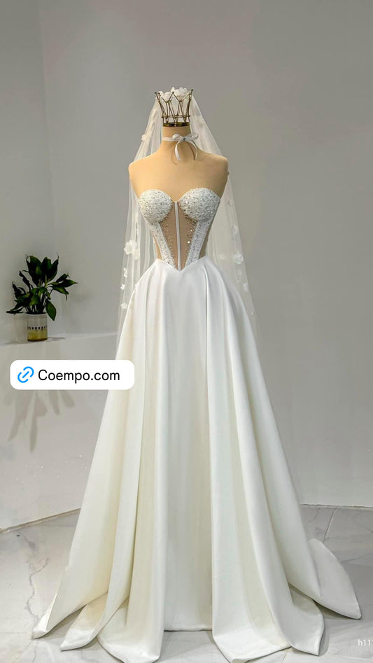 The Cosmopolitan strapless simple satin gown